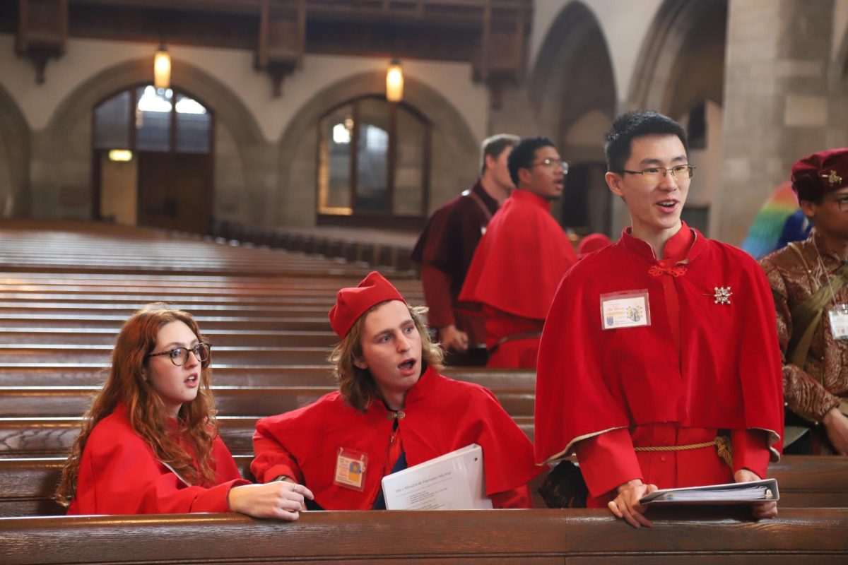 Students participate in a conclave simulation held at Rockefeller Chapel during the University of Chicago's "pope class," formally known as "Italian Renaissance: Petrarch, Machiavelli, and the Wars of Popes and Kings." Courtesy of Joseph DePaula.